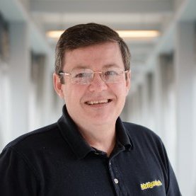 male, head to shoulder picture, smiling